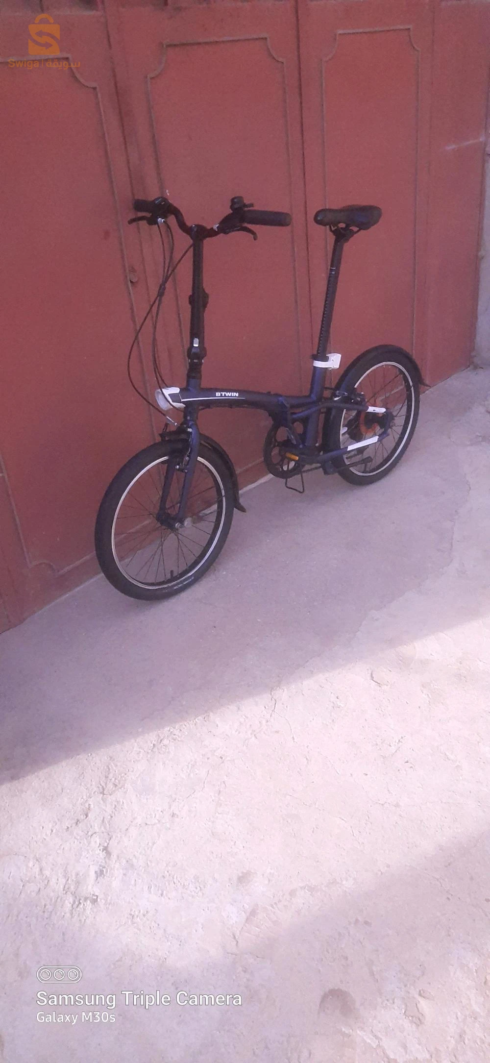 Vélo b'twin pliant tilt 500