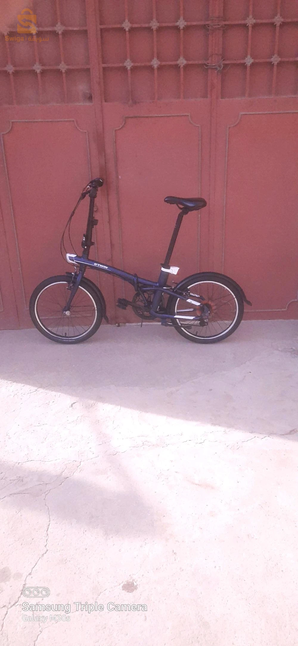 Vélo b'twin pliant tilt 500