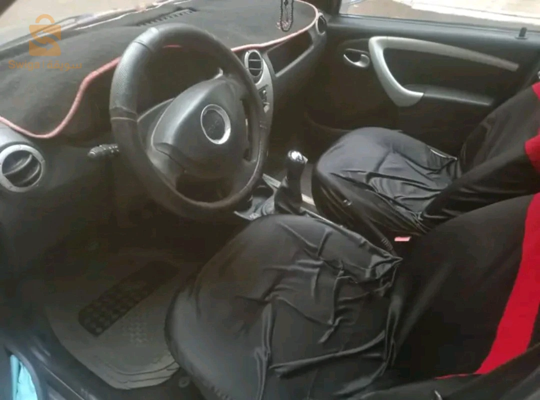 Logan 2013 roule 293 000 km