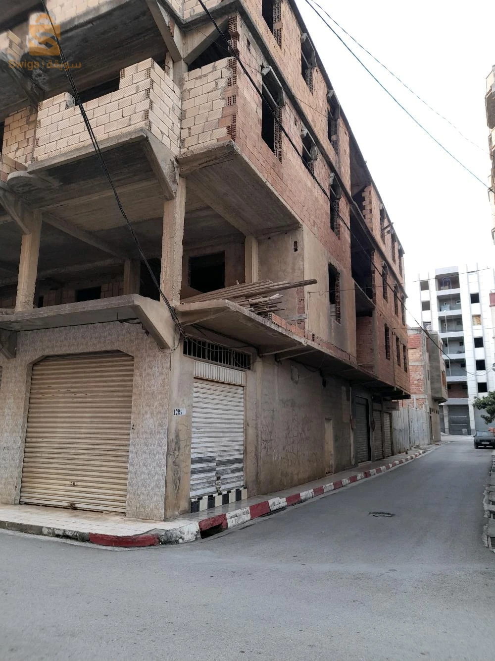 vente maison semi finie,R+3 et 7locaux à bejaia centre ville d'une superficie de 435 mètres carrés bâti ,n; 0657267335 / 0561541612