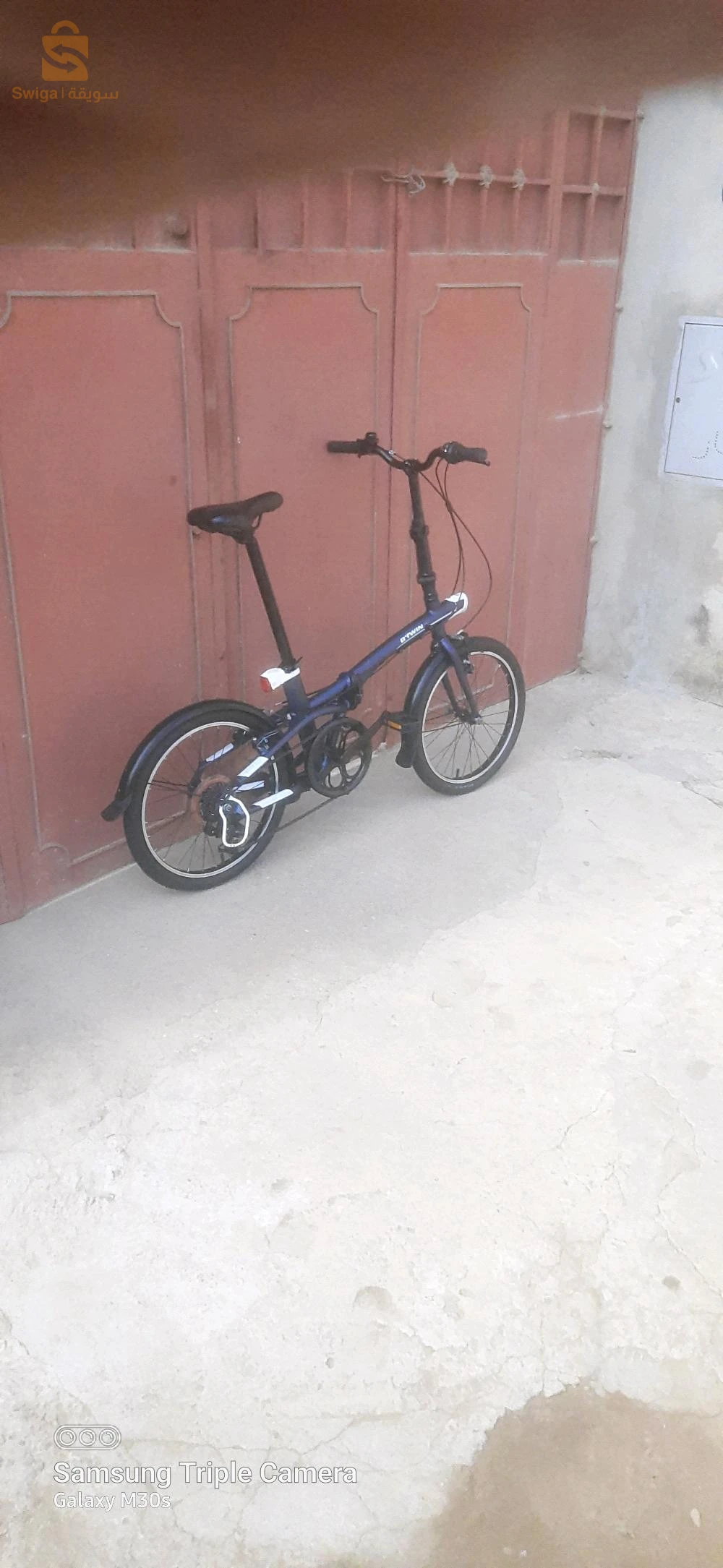 Vélo b'twin pliant tilt 500