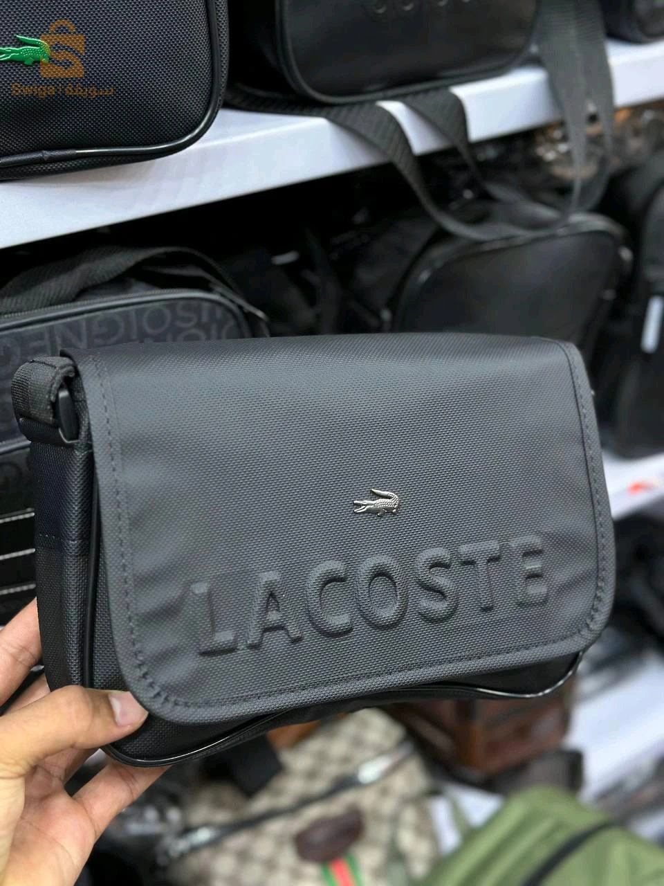 sacocha lacoste