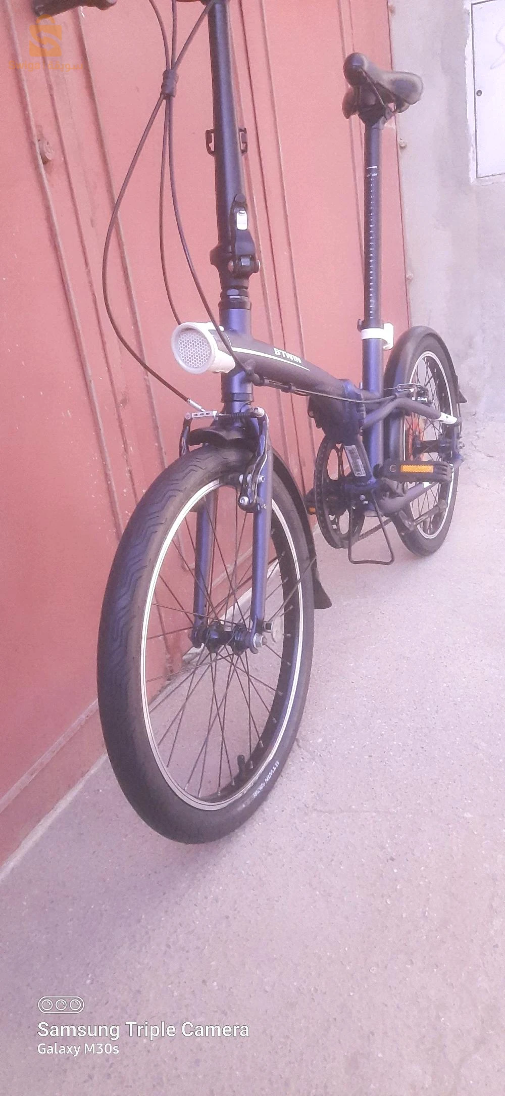 Vélo b'twin pliant tilt 500