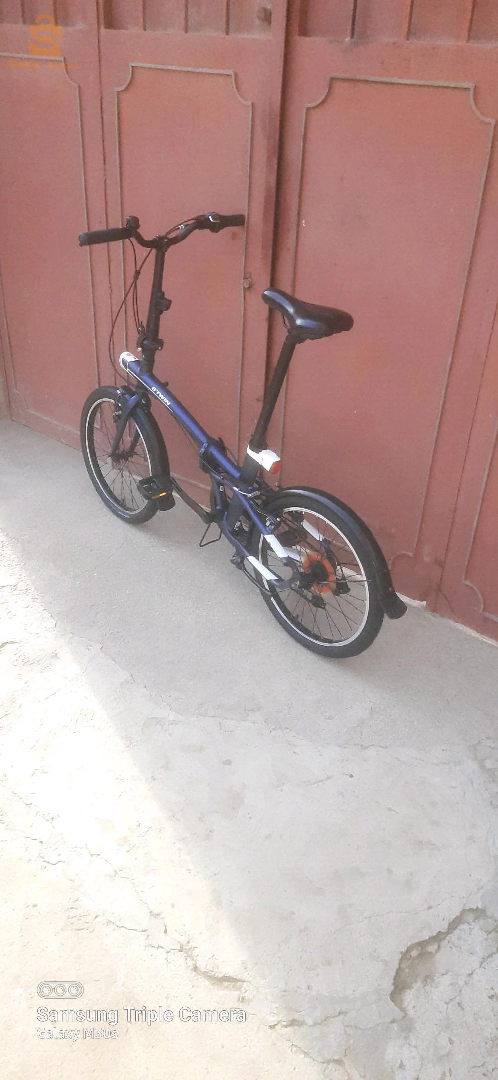Vélo b'twin pliant tilt 500