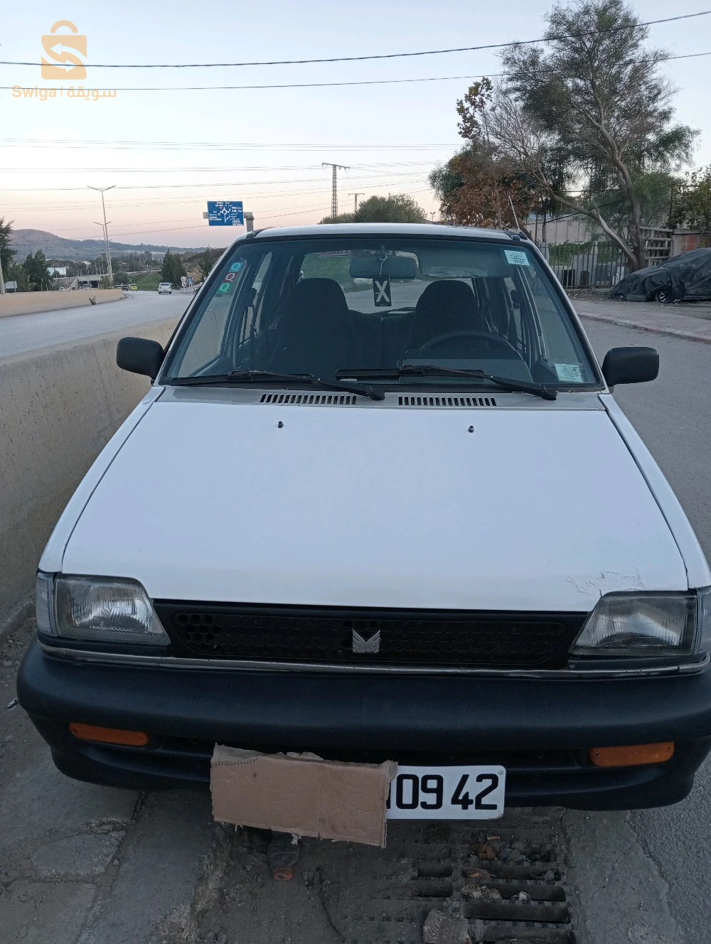 للبيع سيارة ماروتي نقية فيها لال و باب صبيغة نقاوة