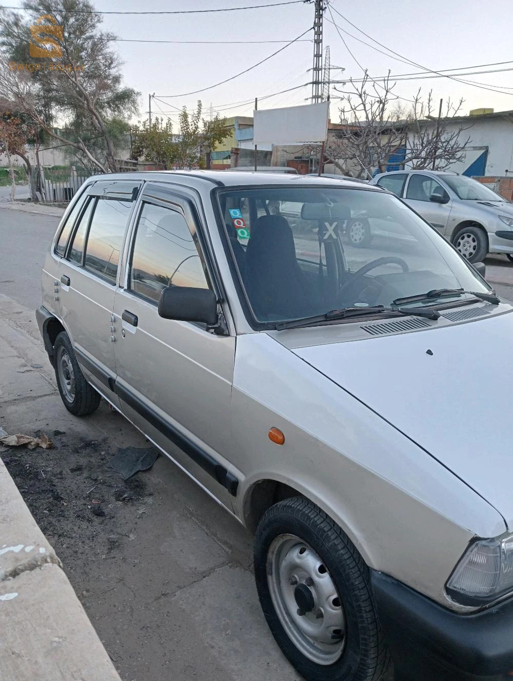 للبيع سيارة ماروتي نقية فيها لال و باب صبيغة نقاوة