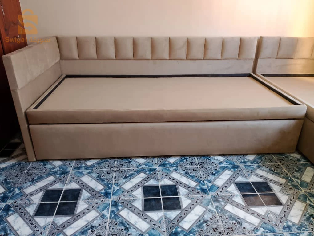 À vendre  Deux lits capitonnés en L, séparables