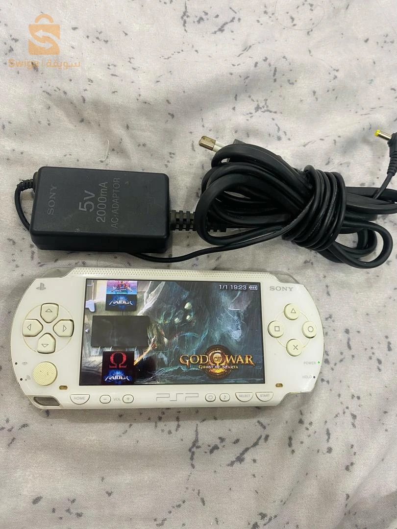 psp flaché avec carte sd 8gb original chargeur original