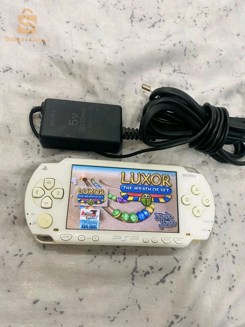 psp flaché avec carte sd 8gb original chargeur original