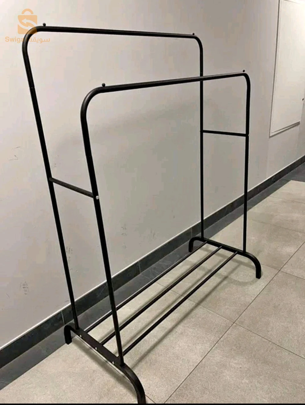 Port vêtements double pôle solide très bien.