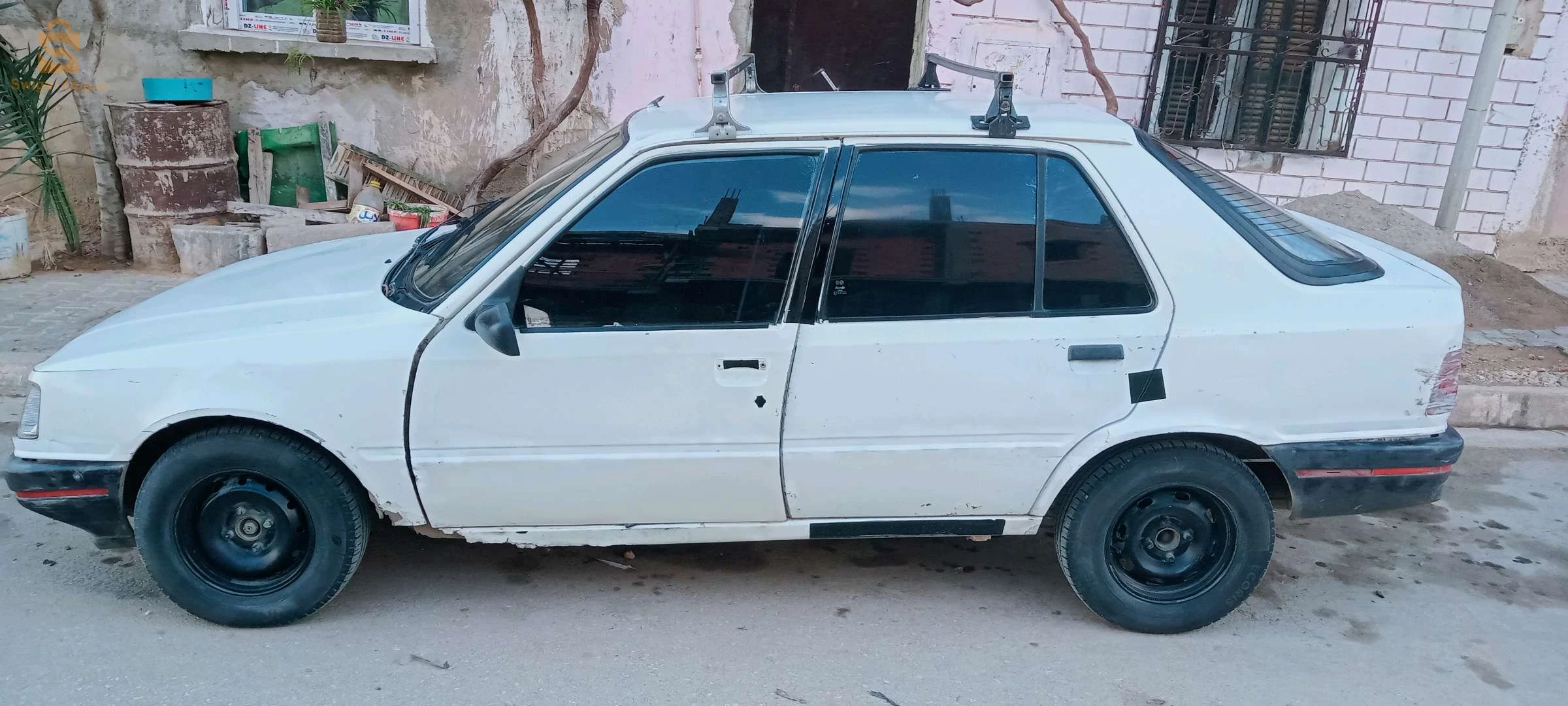 بيجو 309 48 غليزان