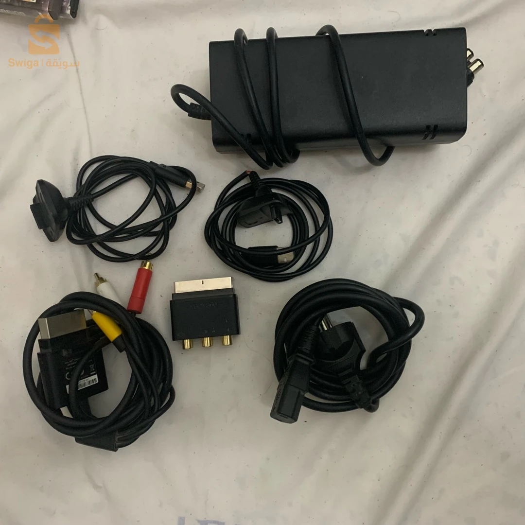 Xbox 360 + Kinect + 2 Manéttes Avec 2 Battries Original Et Son Cable+ 12 Jeux Originaux