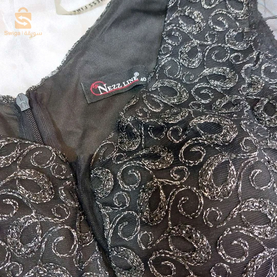 فستان سهرة اسود وفضي