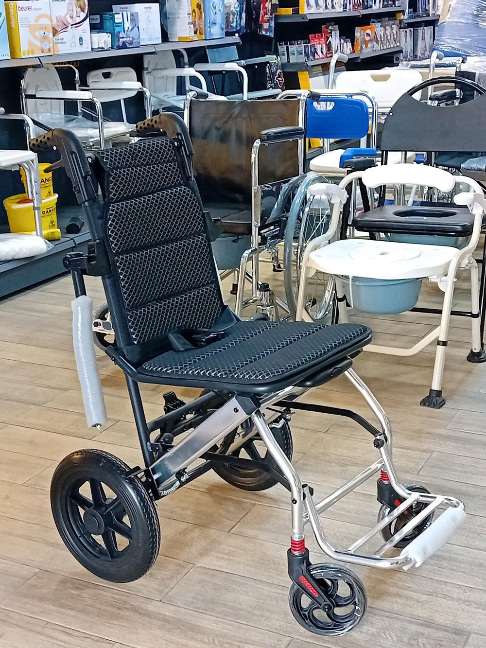 CHAISE DE TRANSFERT كرسي متحرك قابل للطي