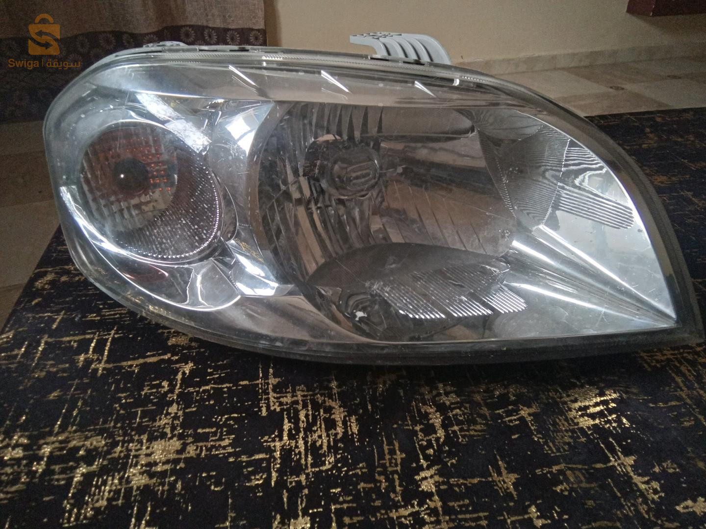 مصباح امامي شيفروليه افيو كوتي بساجي