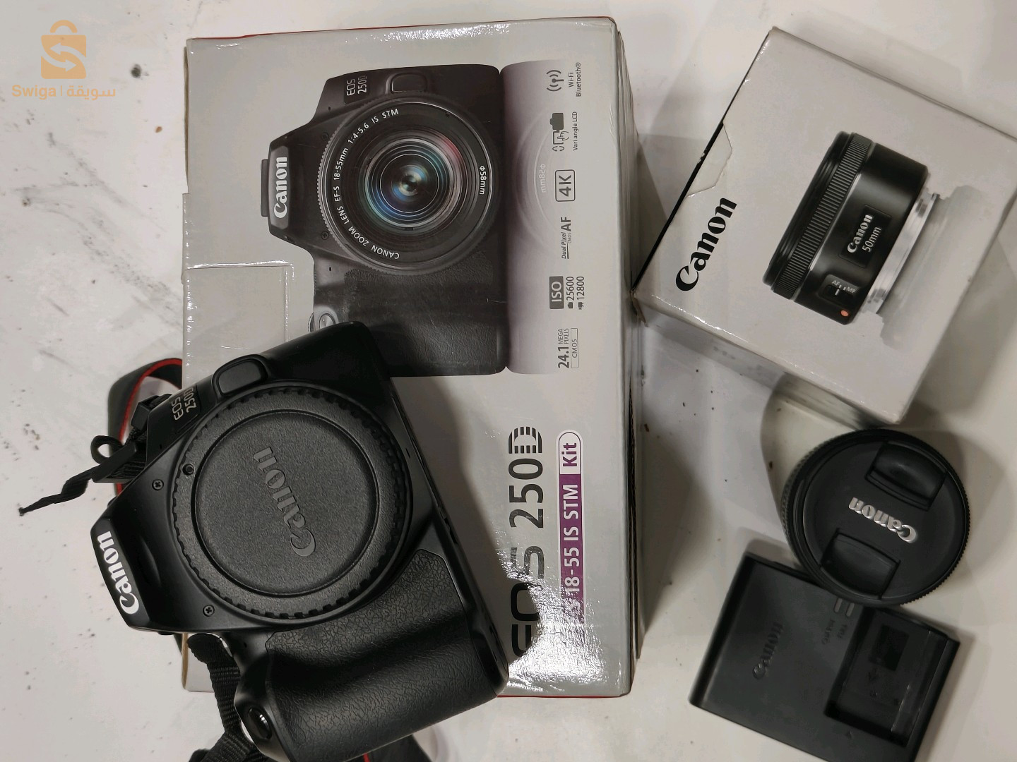 كانون 250d EOS  stm.kit مع اوبجكتيف 18/55m.m مع اوبجكتيف 50m.m f1.8 كلش اورجينال مع الباطة تاعها استعمال زوج خطرات برك