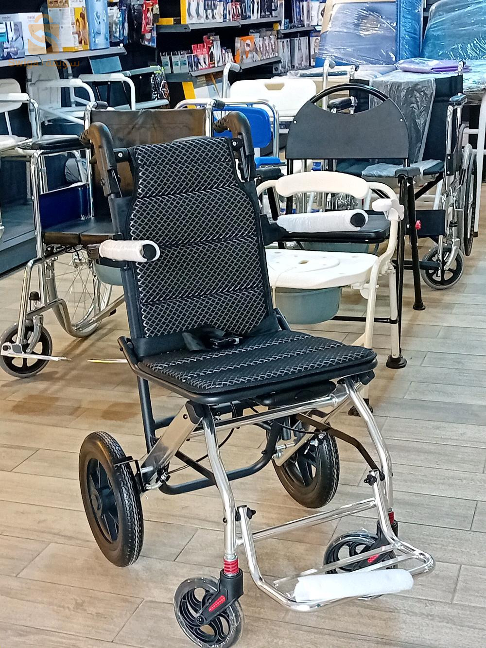 CHAISE DE TRANSFERT كرسي متحرك قابل للطي