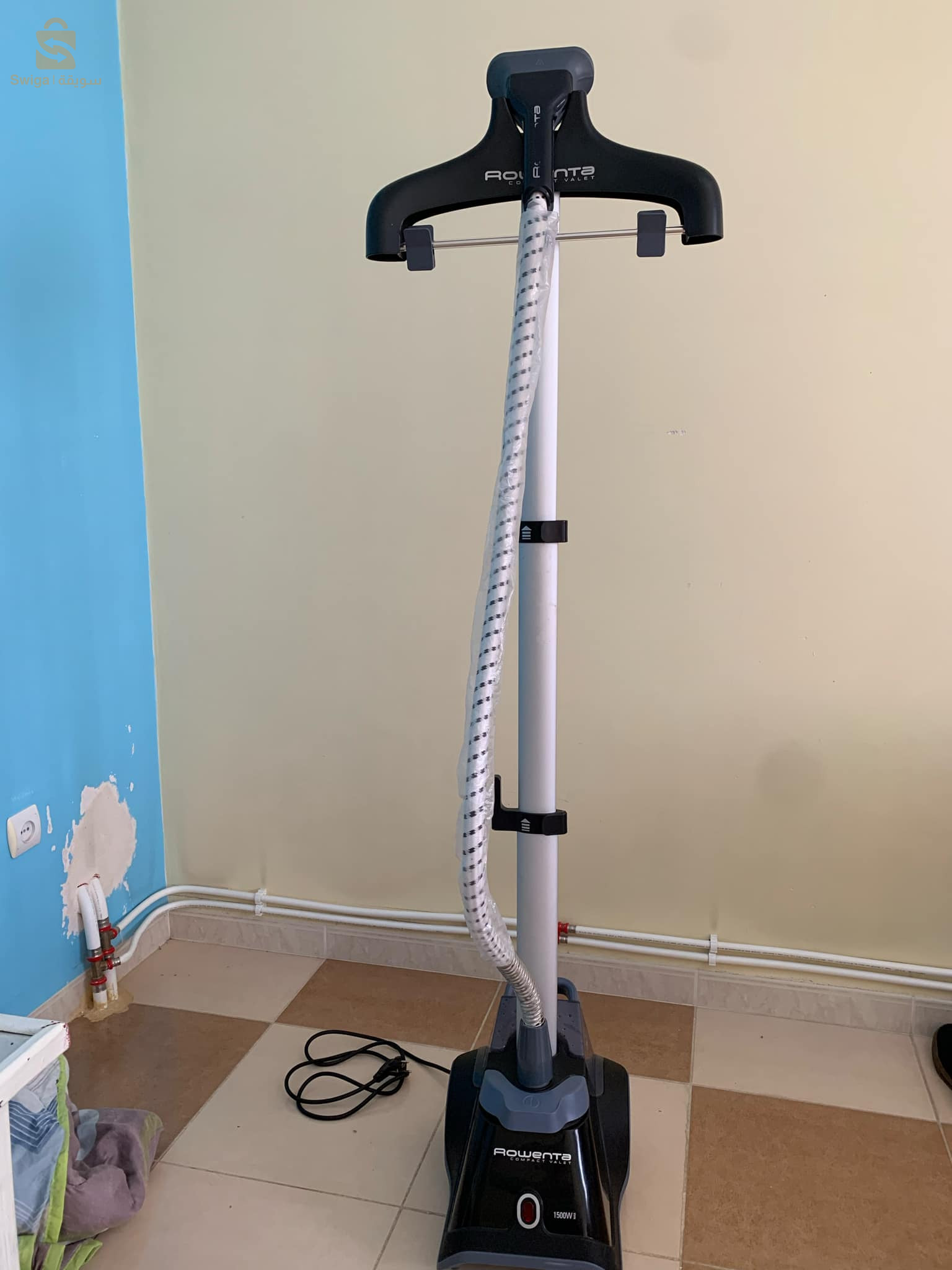 آلة تجفيف الملابس