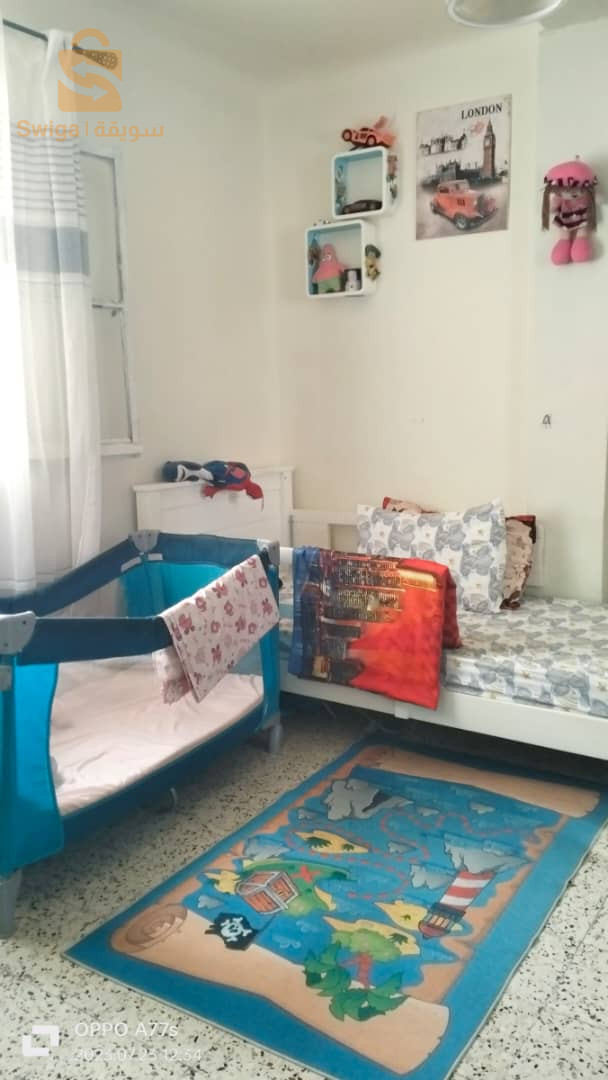 سكن f3 بحي 350 مسكن مستغانم مقابل اقامة الجوهرة الطابق الاول بالعقد و الدفتر العقاري