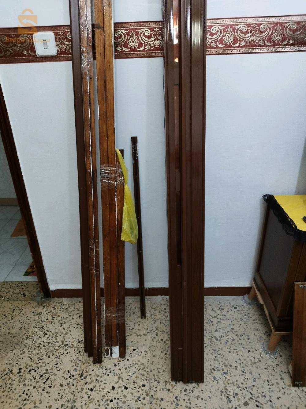 porte.  accordéon
