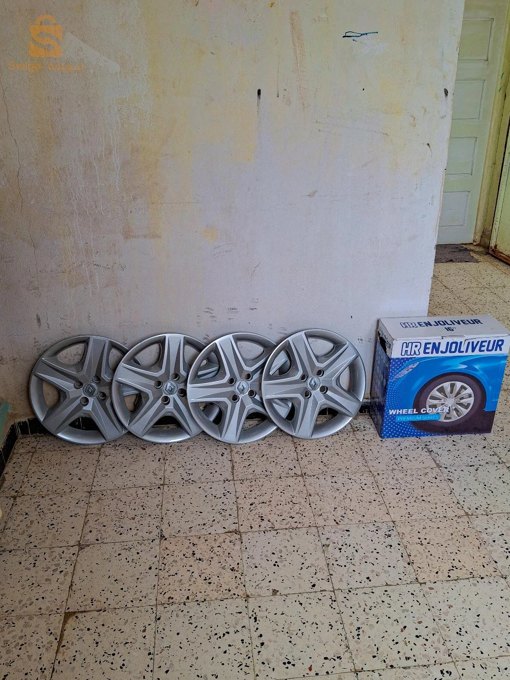 les enjoliveurs Symbole nouveau