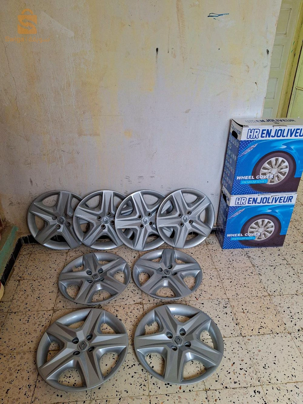 les enjoliveurs Symbole nouveau