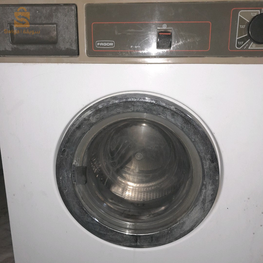 machine à laver automatique lavage essorage séchage marque FAGOR très bon état marque européenne