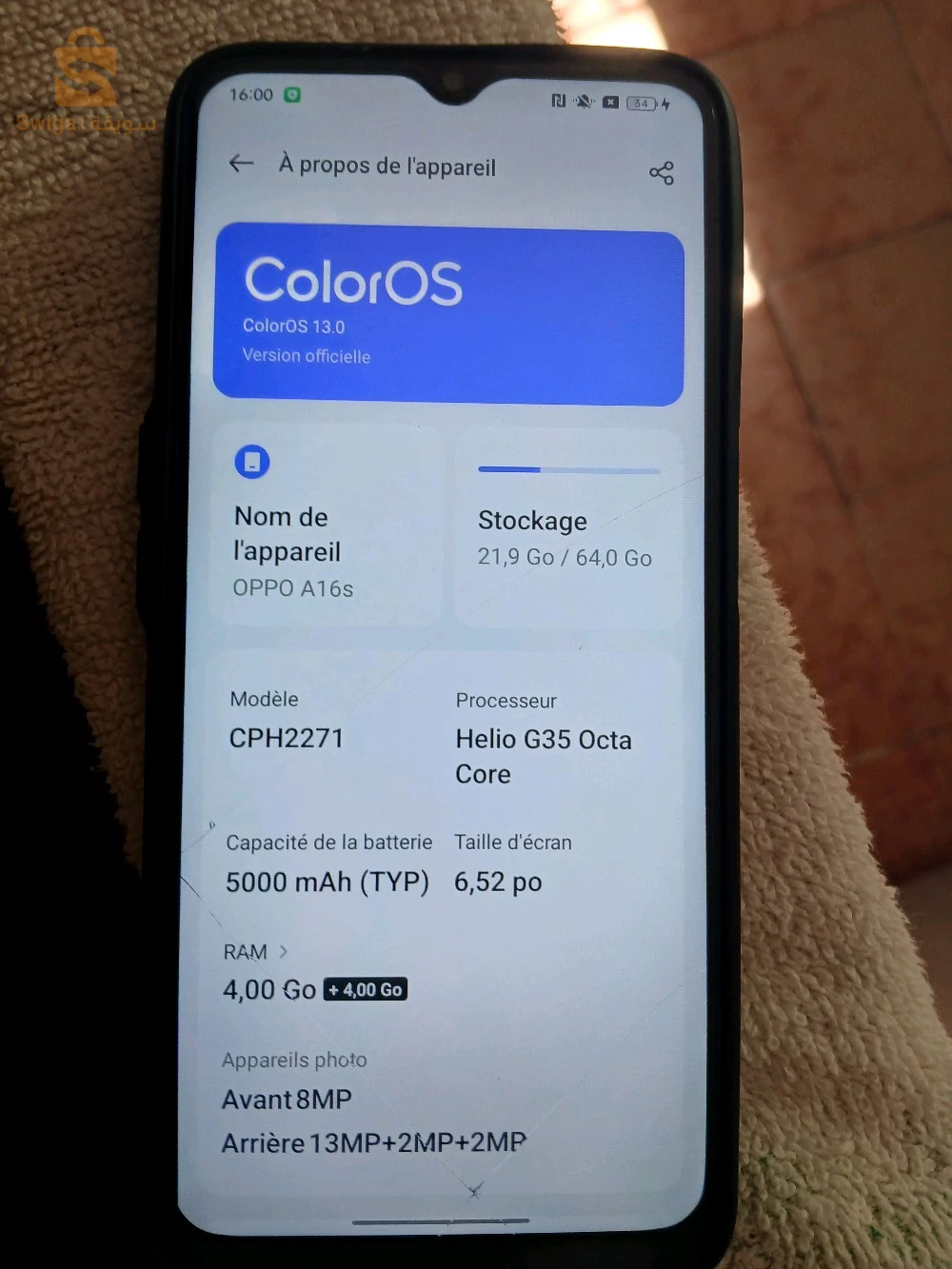 📱 Oppo A16s 
Écran : 6,52 pouces – HD+
Processeur : MediaTek Helio G35
RAM : 4 Go
Stockage : 64 Go (extensible via carte microSD)
Appareils photo :
Arrière : Triple – 13 + 2 + 2 MP
Avant : 8 MP
Batterie : 5000 mAh
Système : Android 11
Empreinte digitale : sur le côté
NFC : Oui