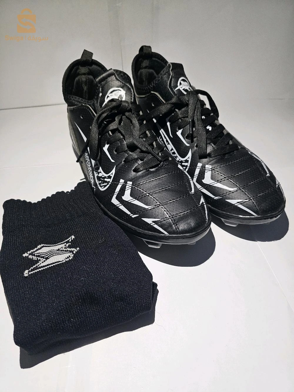 Soulier avec chaussettes de foot