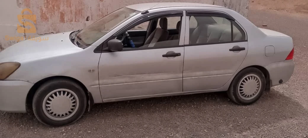 ميتسوبيشي Lancer 2006 10 البويرة