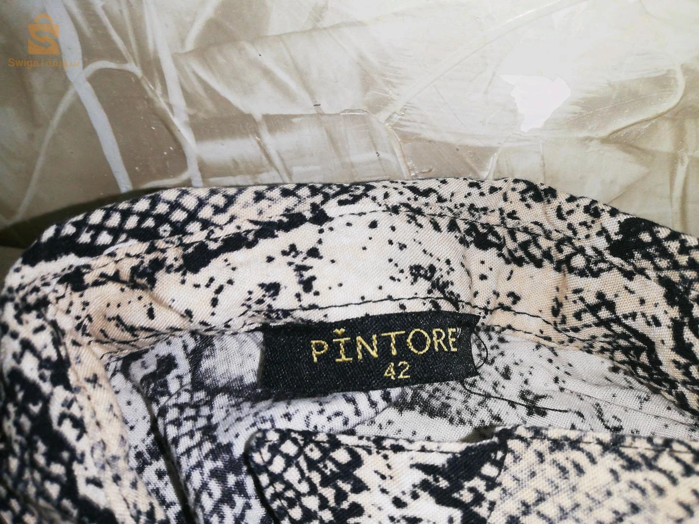 قمصان وبلوزات 