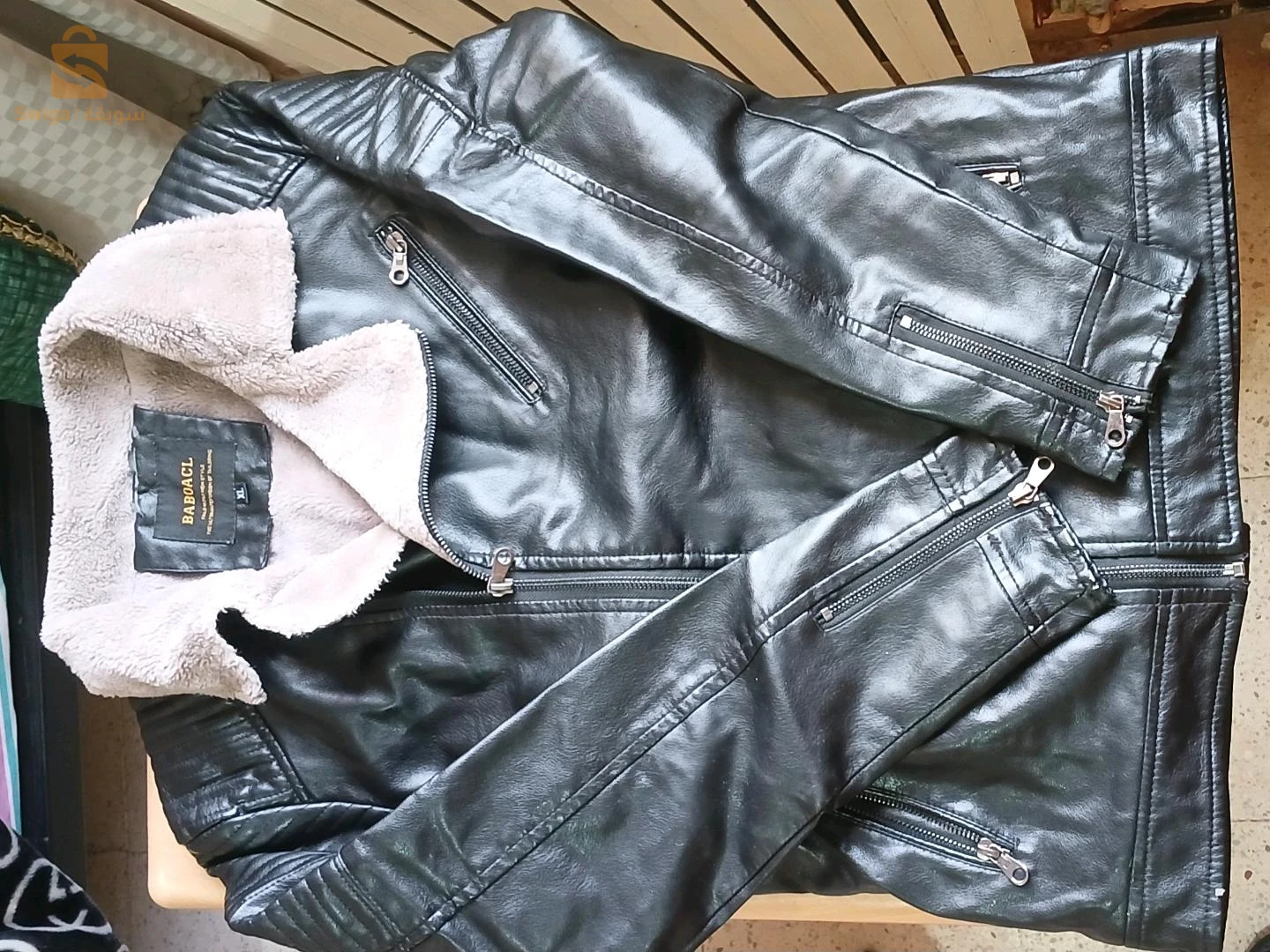 البدلات والمعاطف والسترات 