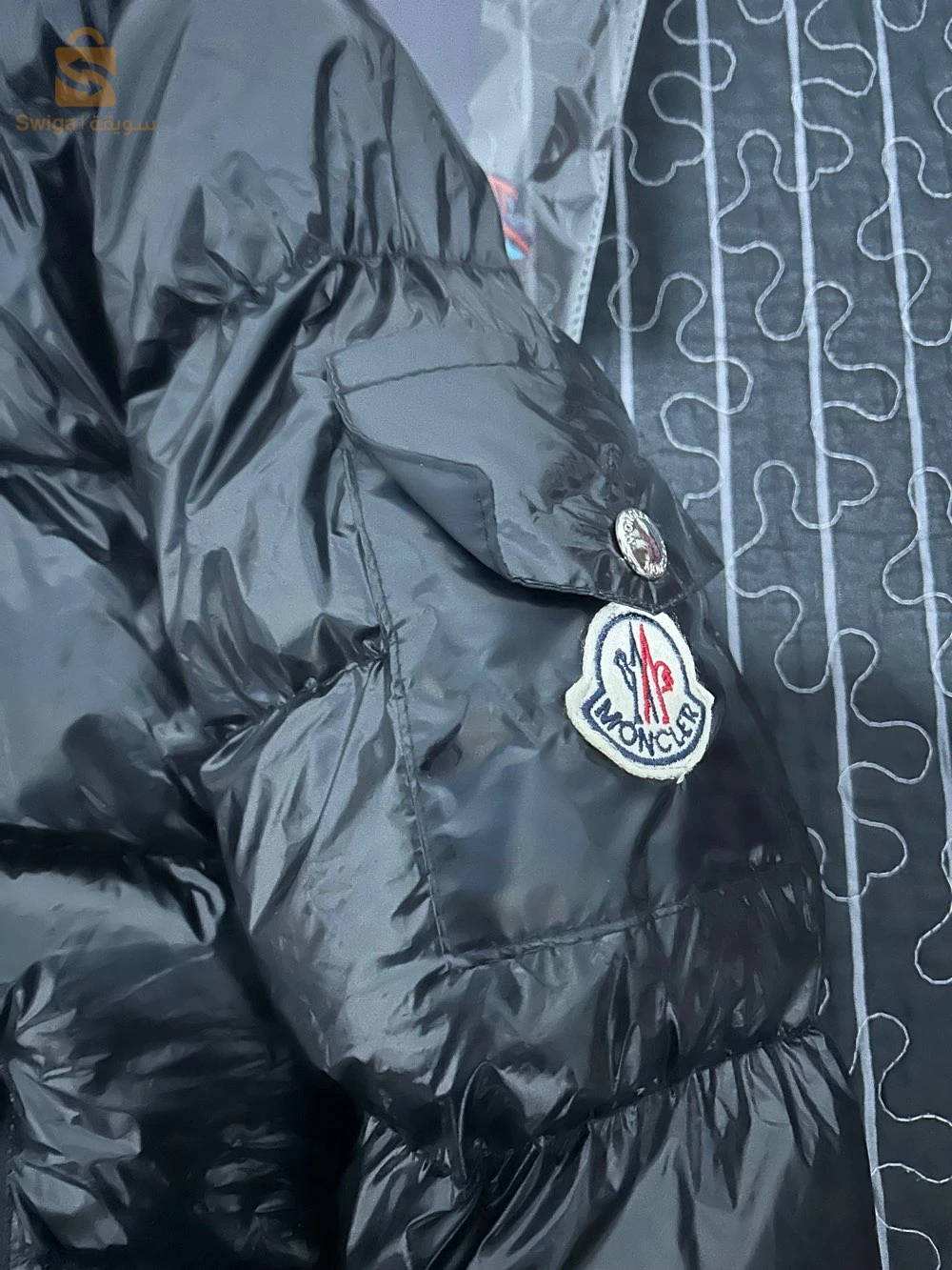 une doudoune moncler taille M homme
