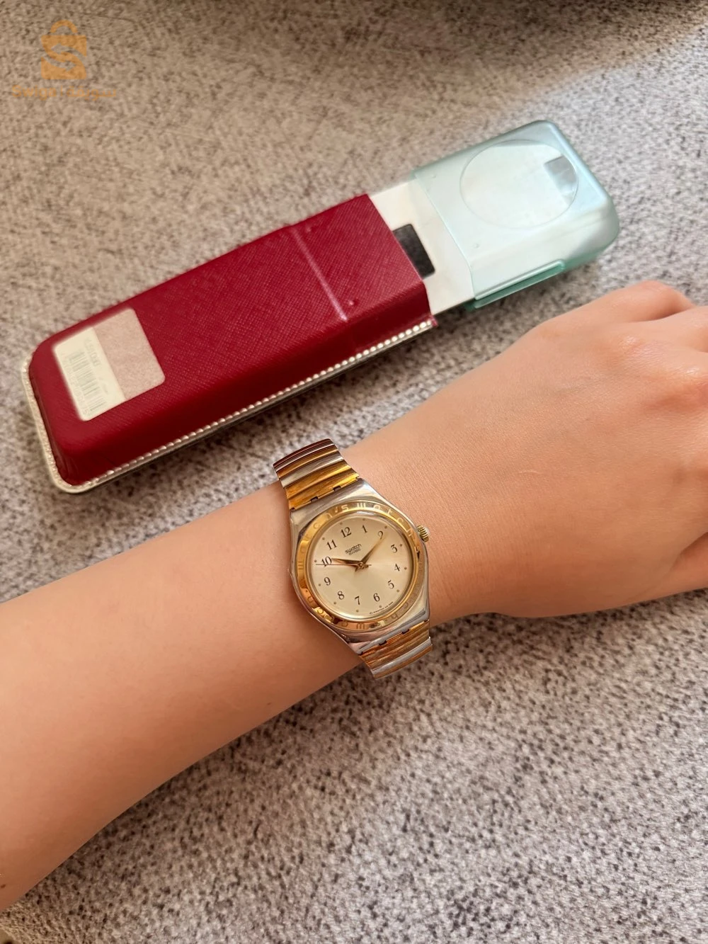 montre swatch original femme