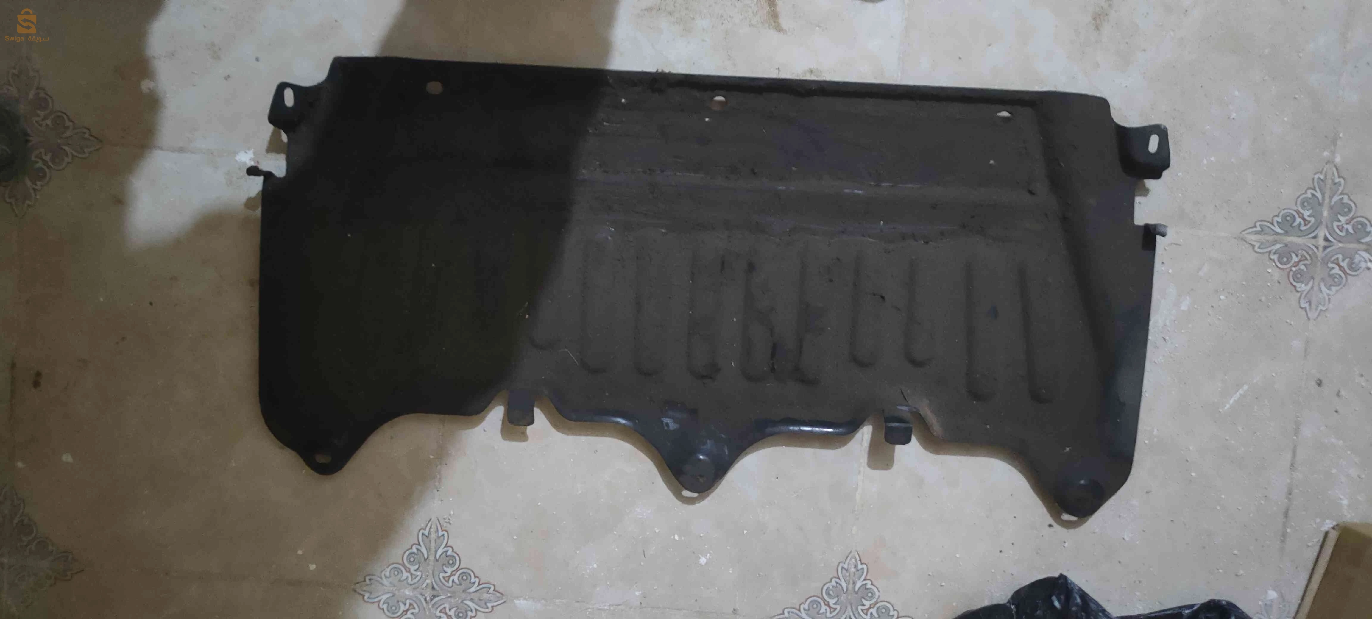 Protection carters pour Renault Clio 3"
  · "Sous-bassins moteur Clio III"
غطاء سفلي لمحرك سيارة كليو 3 فراشة