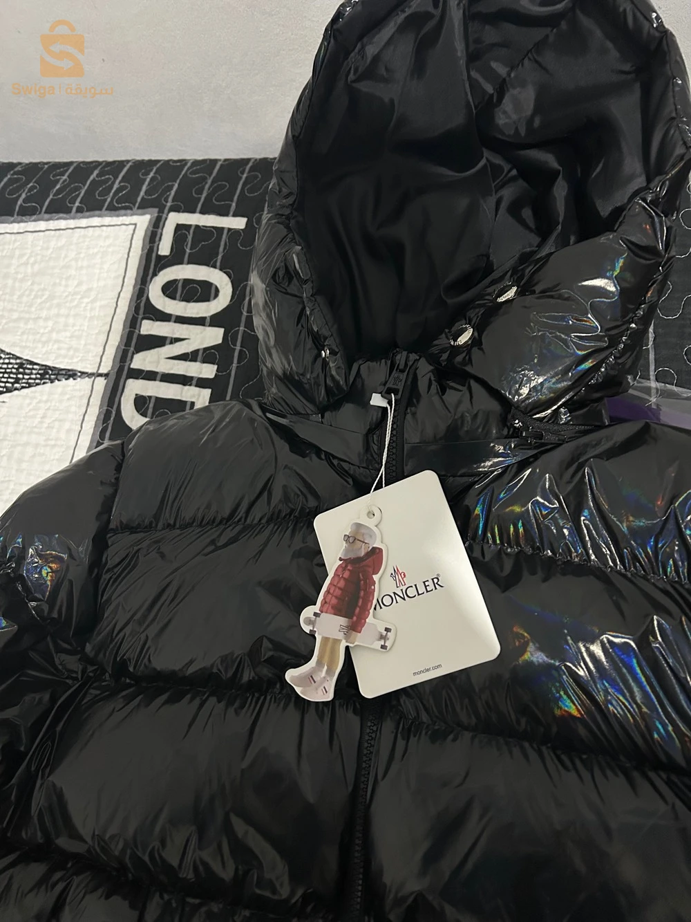 une doudoune moncler taille M homme