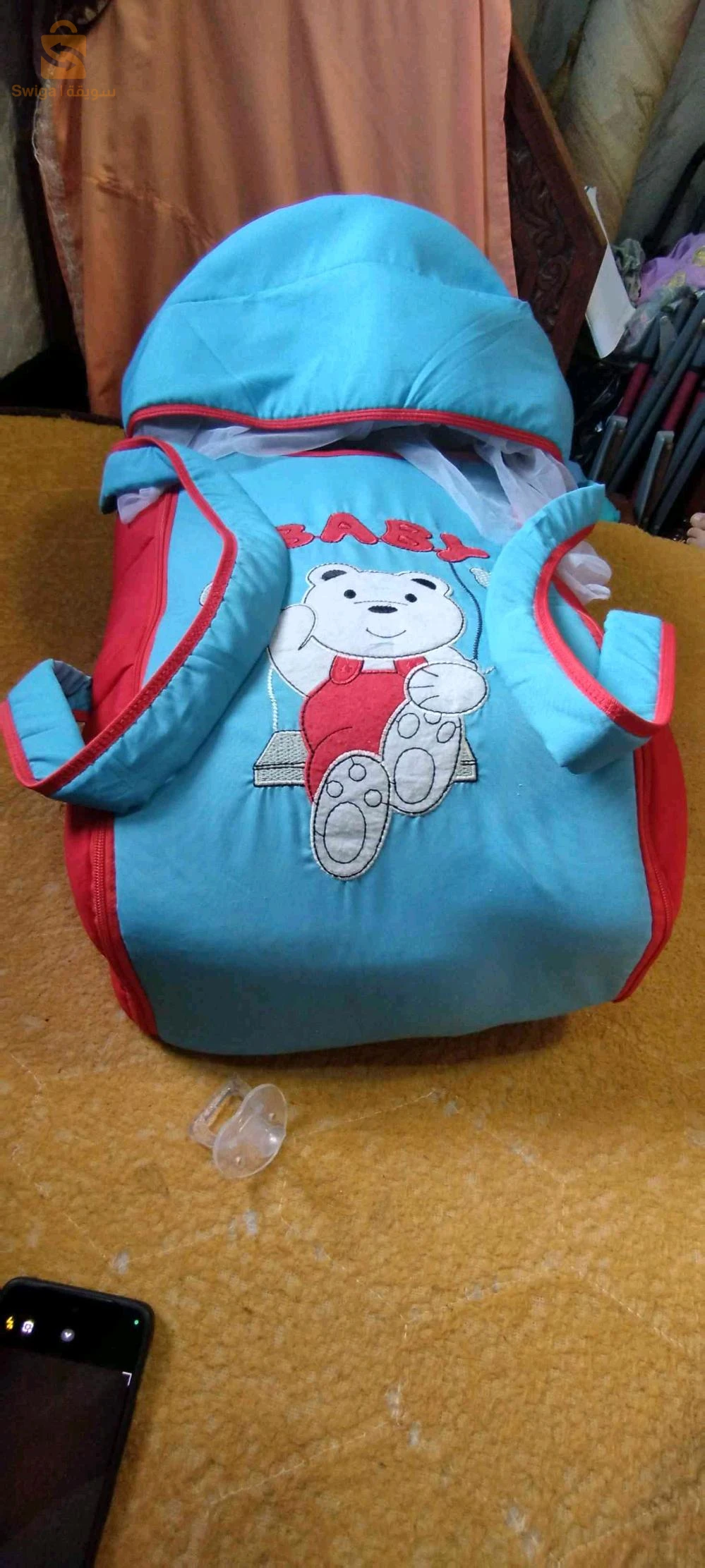 coufi et porte bébé