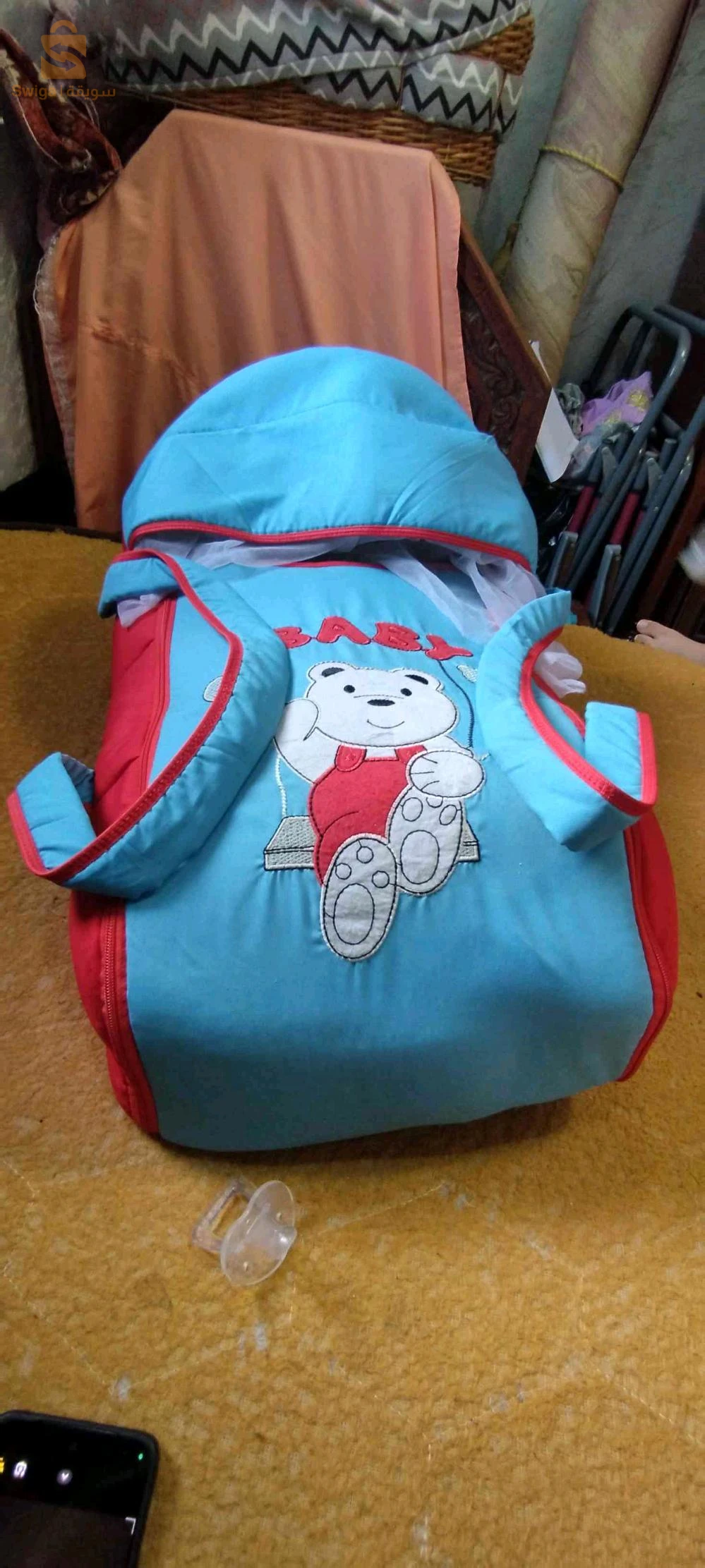 coufi et porte bébé