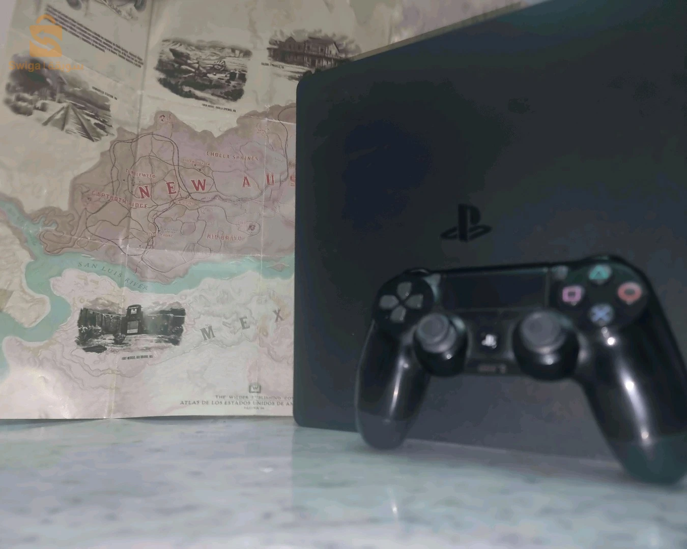 PS4SLIM 1TB مفلاشي12.02 بدون قرص+21لعبة+فلاش ديسك128GB