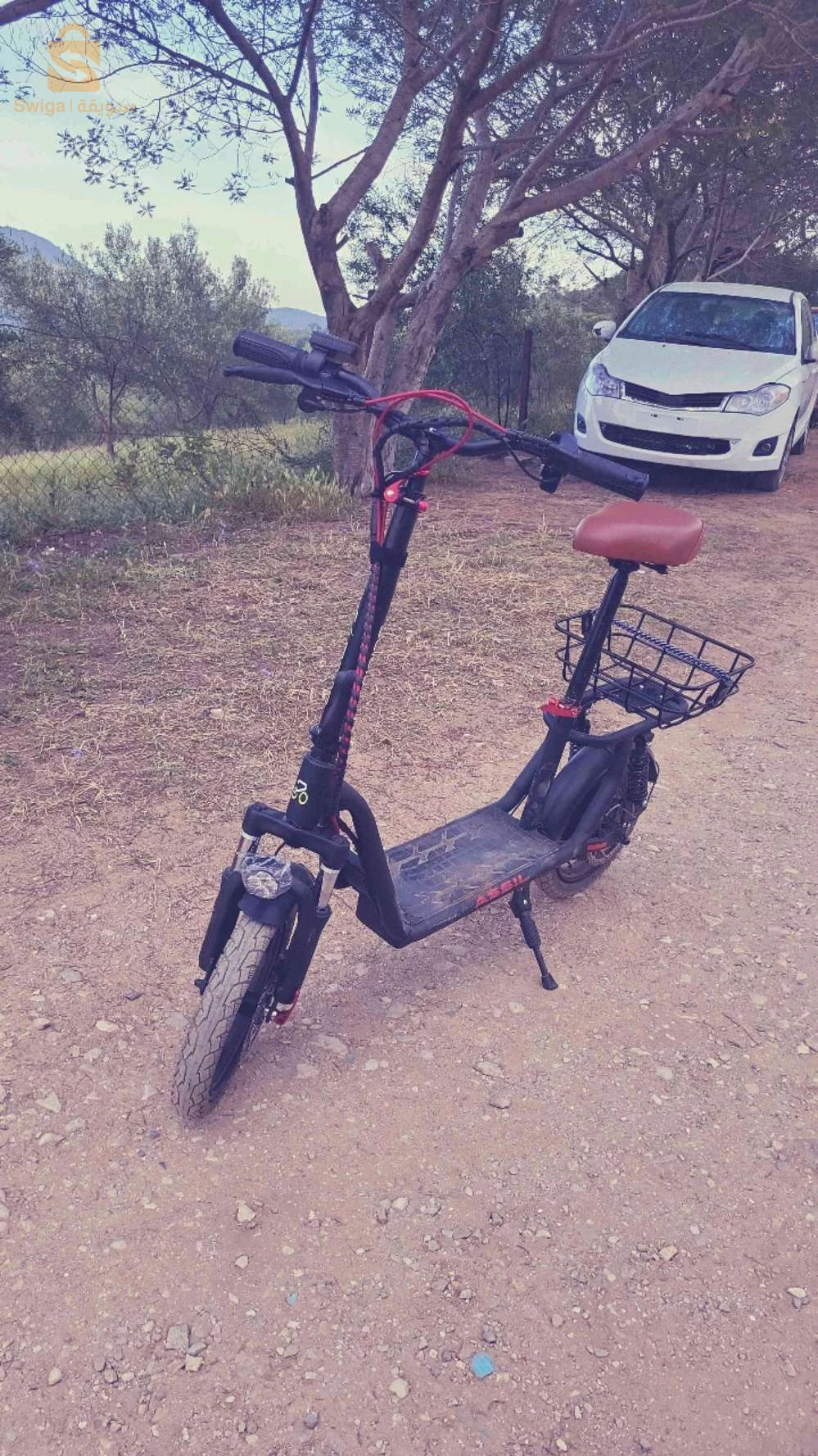 Scooter
  E⚡zeride Assil