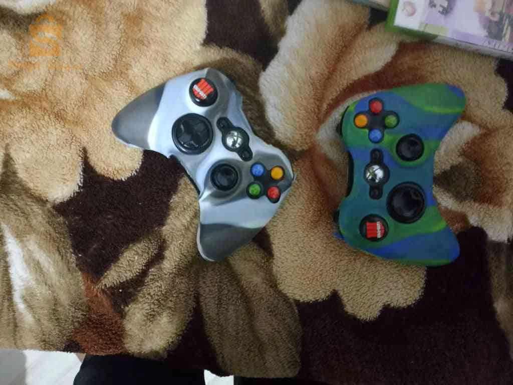Xbox 360 slim 2 mannet d'origine بالفولو اجمعي شارجور قيس 300 29 سيدي وفيها 53 لعبة مسطالية مفلاشية و مغليشية