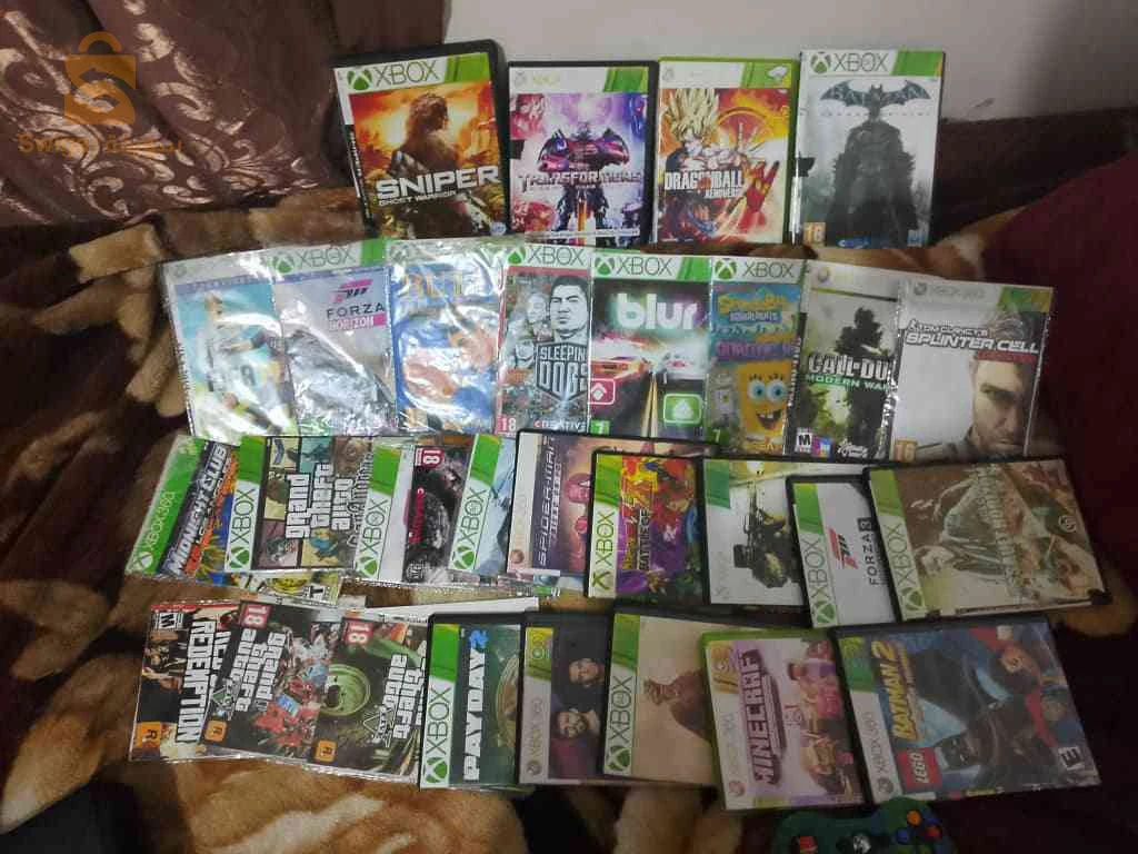 Xbox 360slim 2manet d'origine بالفولو جديدة