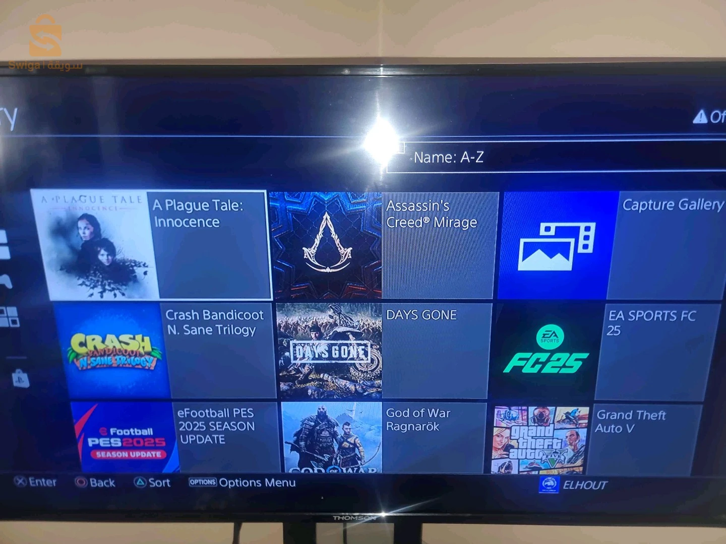 PS4SLIM 1TB مفلاشي12.02 بدون قرص+21لعبة+فلاش ديسك128GB