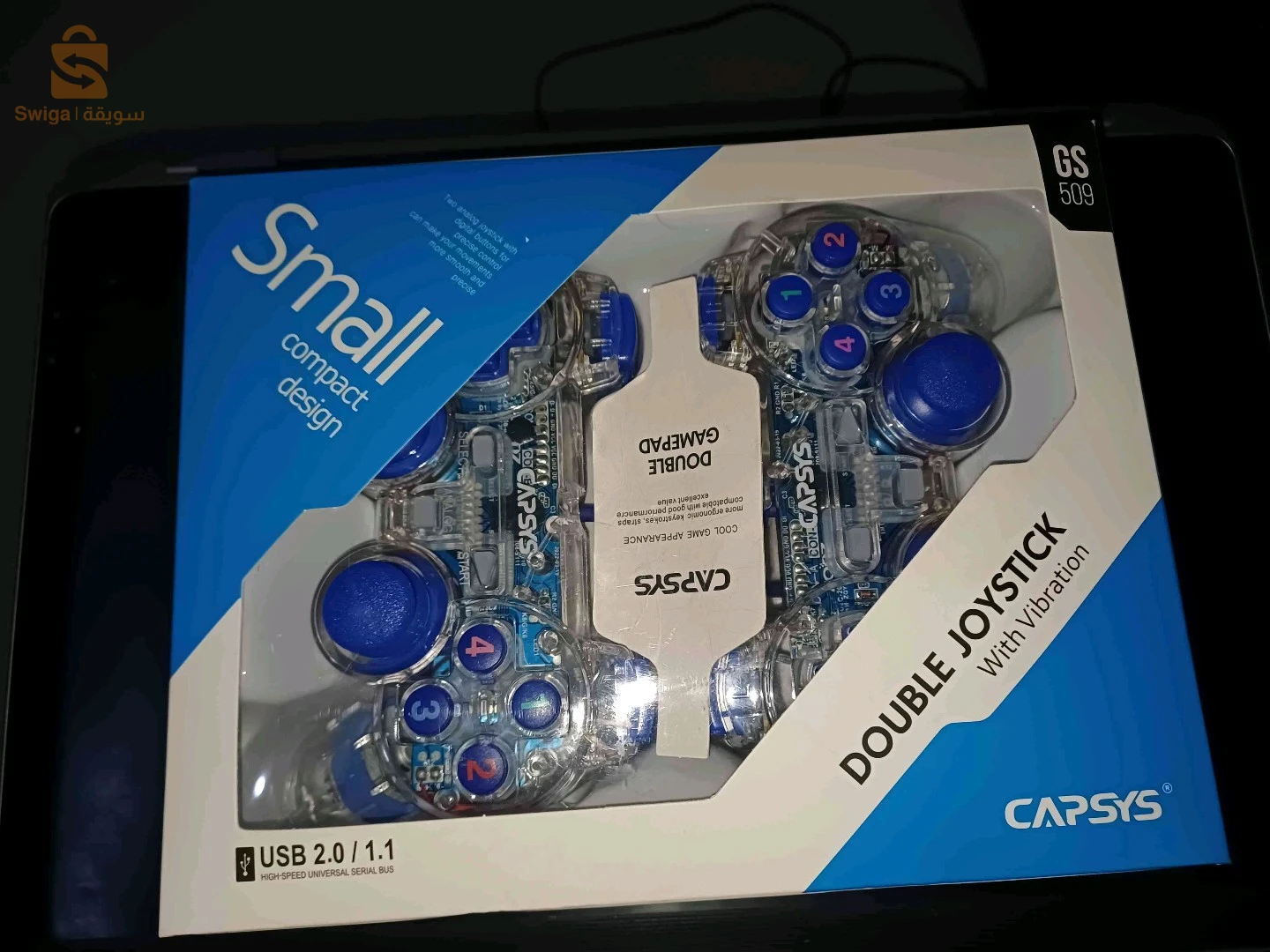 Two computer controllers with blue light