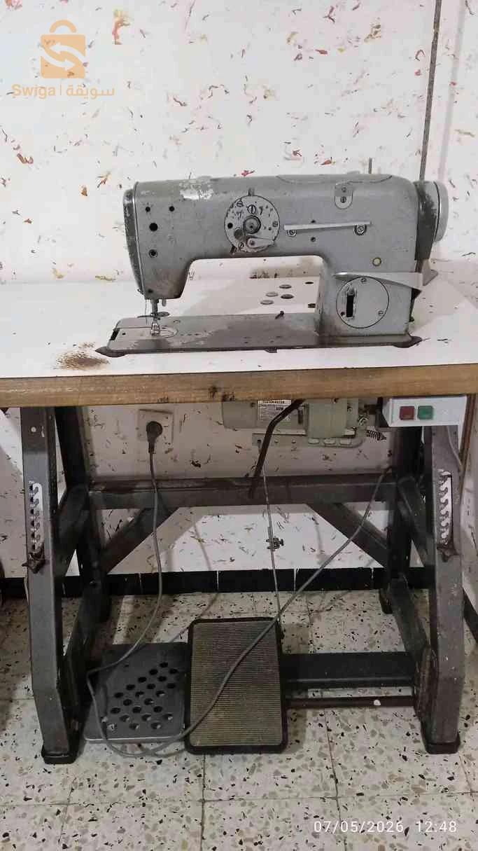 الة خياطة تكستيما