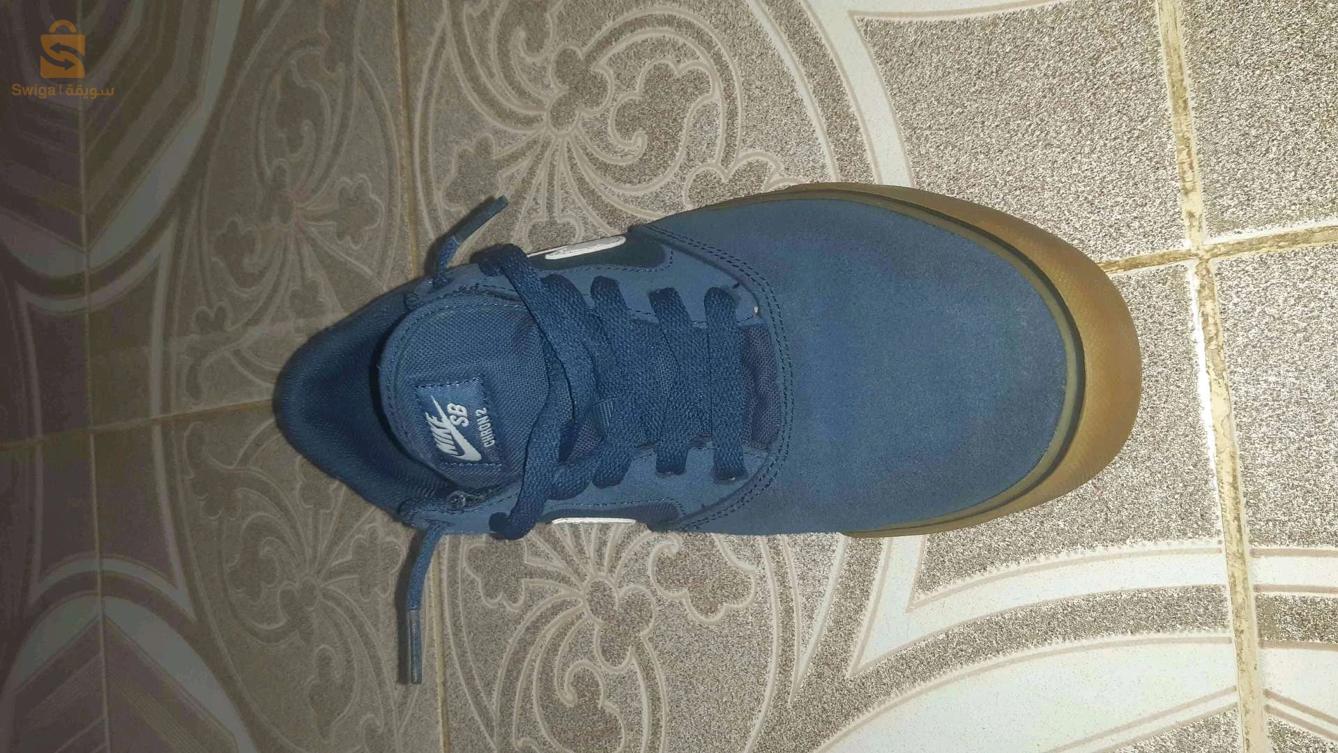 des chaussures NIKE bleu