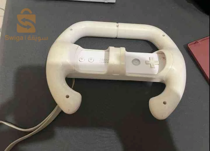 Nintendo la Wii accompagné avec fais des de jeux et de soutien pour jouer