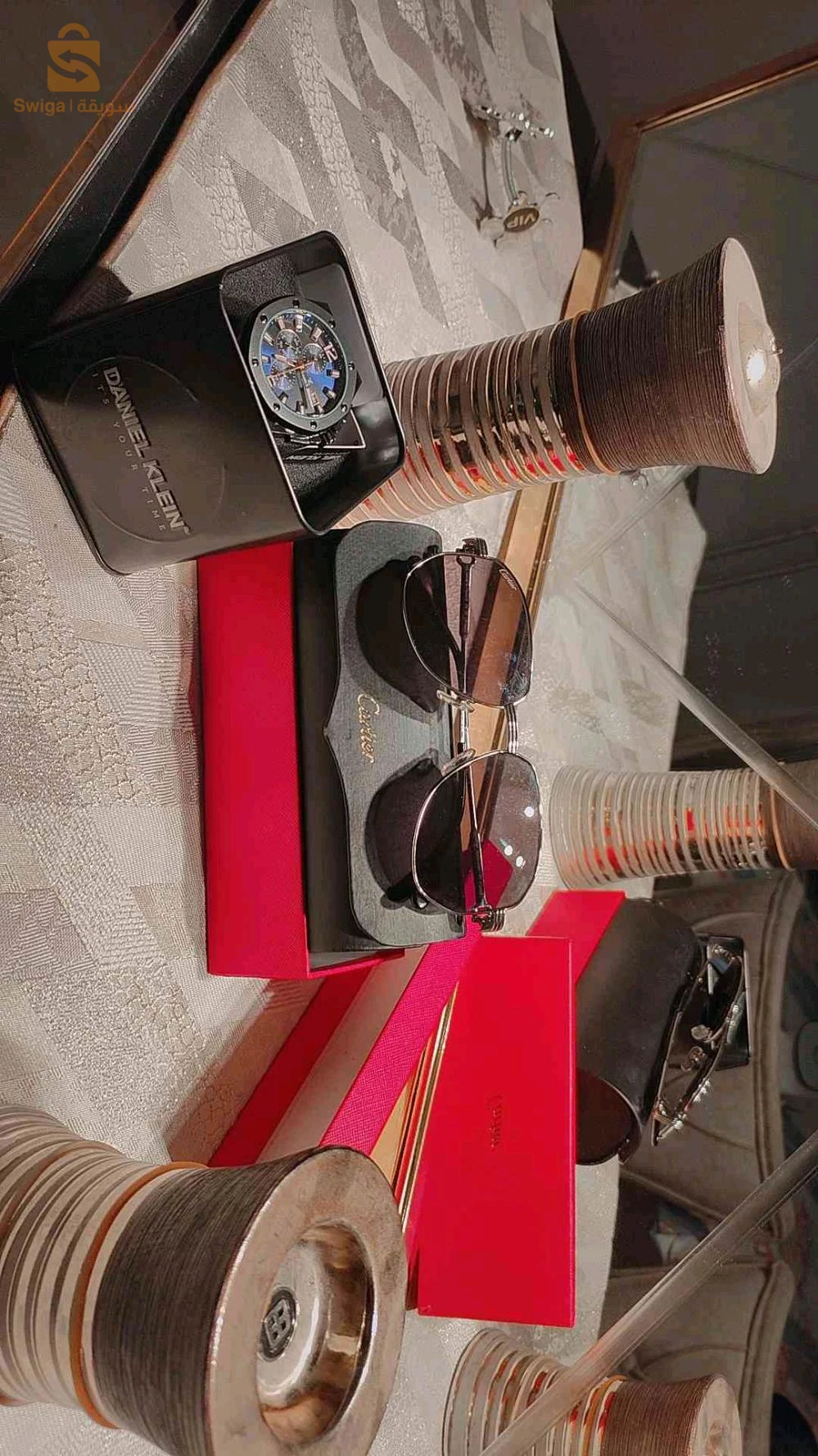 ساعة ونظارات اصلية