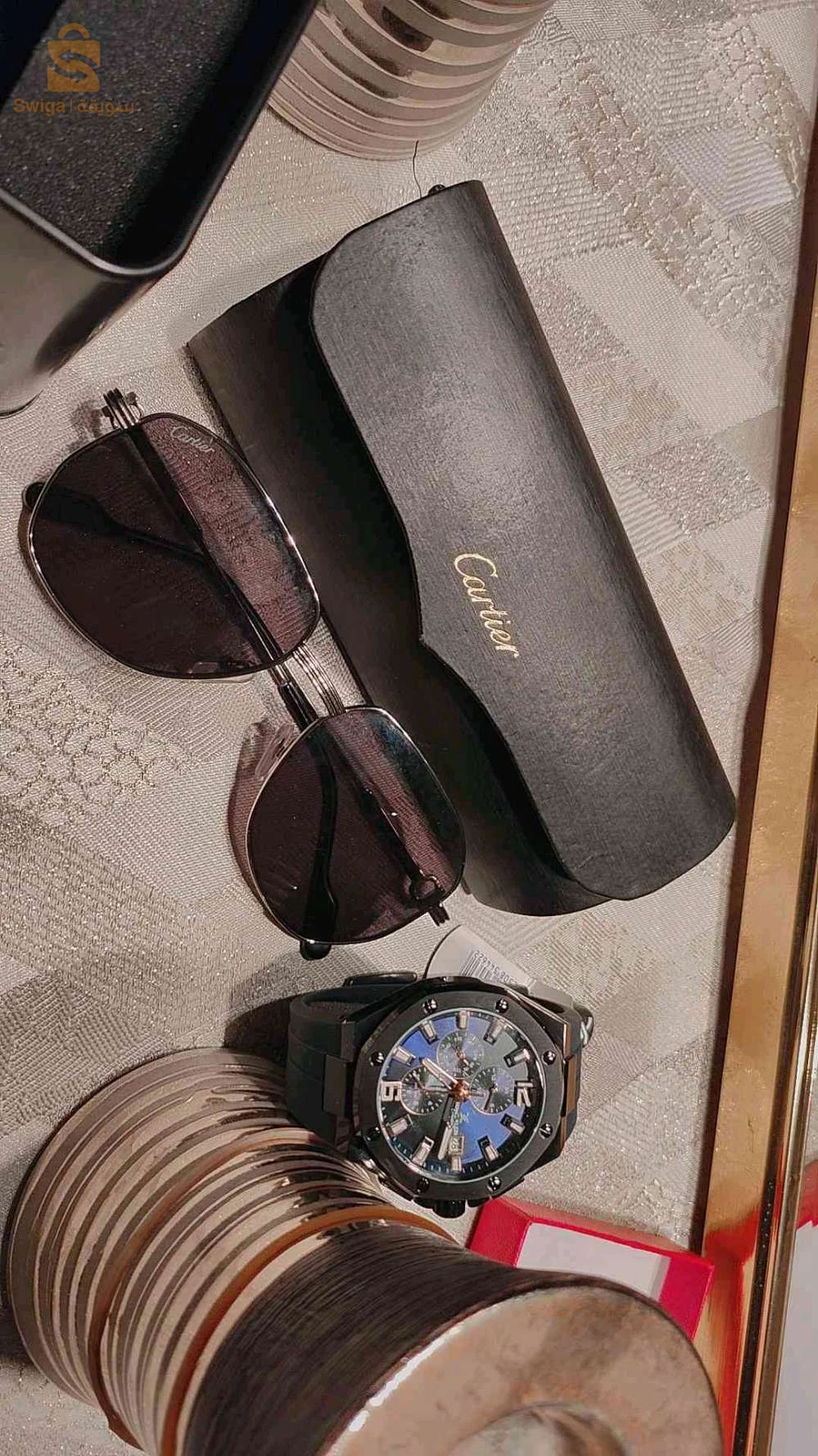 ساعة ونظارات اصلية