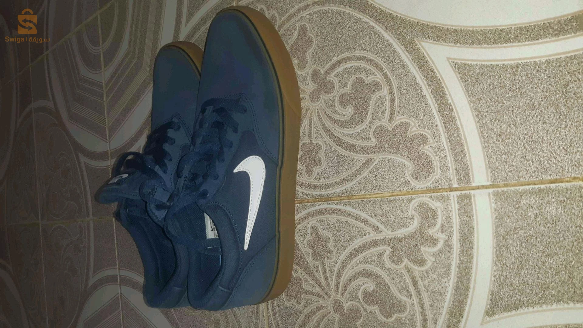des chaussures NIKE bleu
